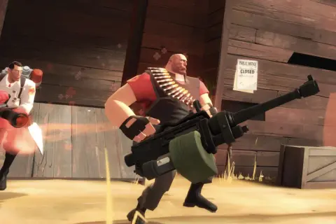 Dwaj bohaterowie z TF2: Medic z miotaczem i Heavy z minigunem w akcji.