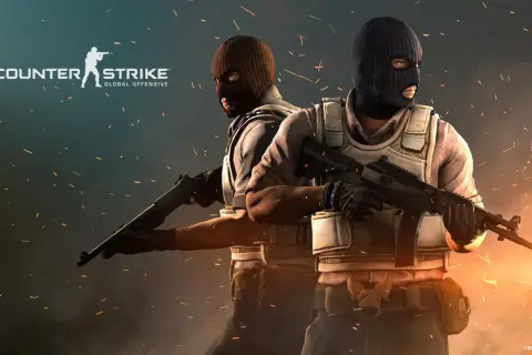 Dwóch zamaskowanych graczy Counter-Strike: Global Offensive z bronią, gotowych do akcji. Idealny obrazek do poradnika CS GO.