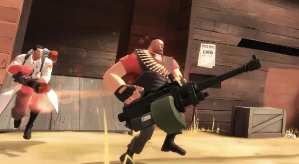 Dwaj bohaterowie z TF2: Medic z miotaczem i Heavy z minigunem w akcji.
