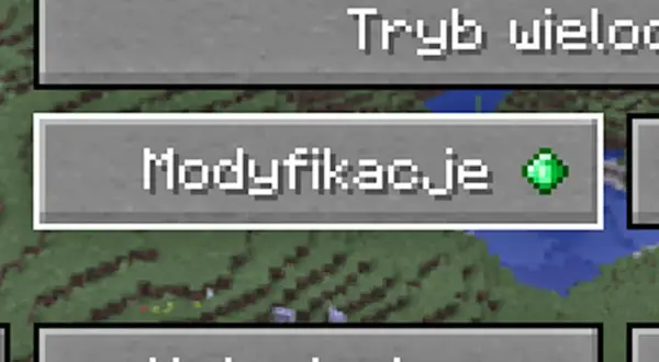 Ekran gry Minecraft z opcją "Modyfikacje", która jest kluczem do tego, jak wgrać mody do Minecraft.