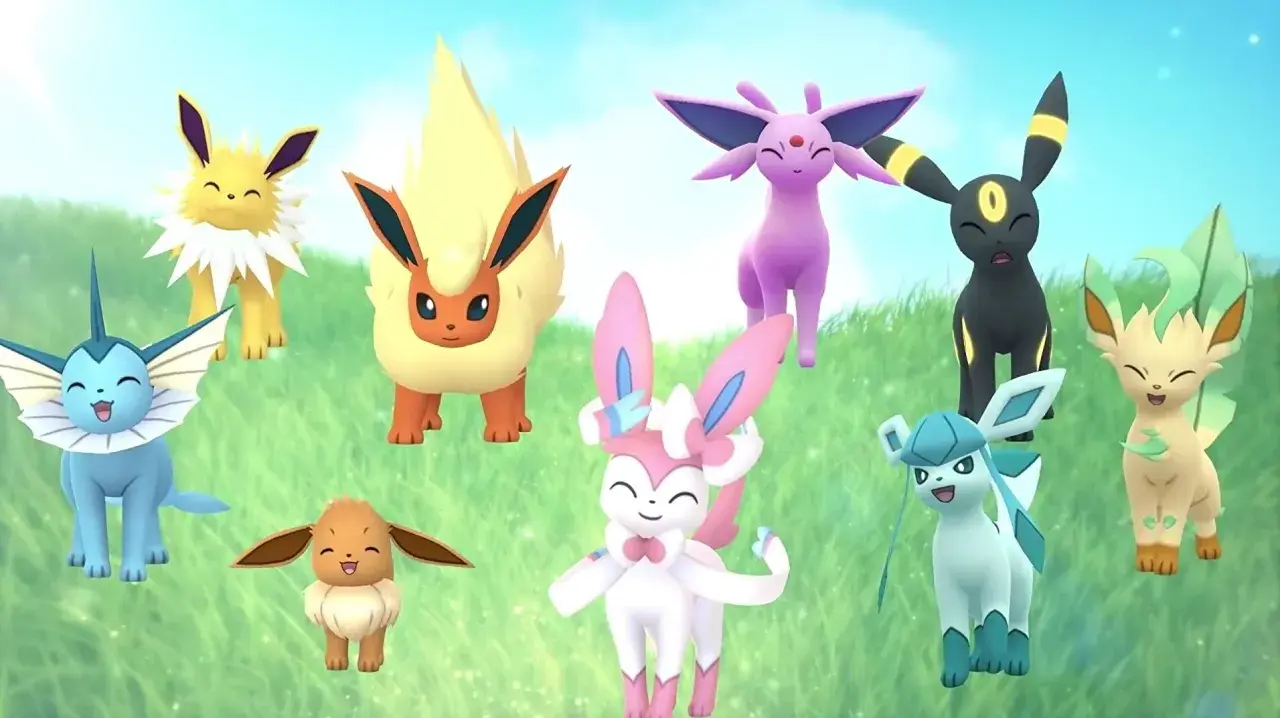 Wesołe nowe ewolucje Eevee: Vaporeon, Jolteon, Flareon, Espeon, Umbreon, Leafeon, Glaceon i Sylveon na trawiastym tle.