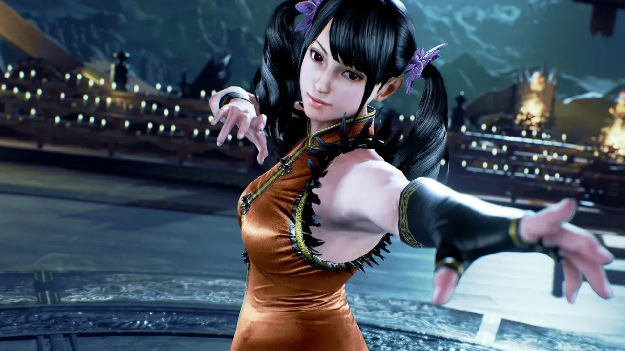 Ling Xia z Tekken 7 w pomarańczowej sukience, gotowa do walki. Dowiedz się, jak odblokować postacie w Tekken 7 i odkryj jej sekrety!