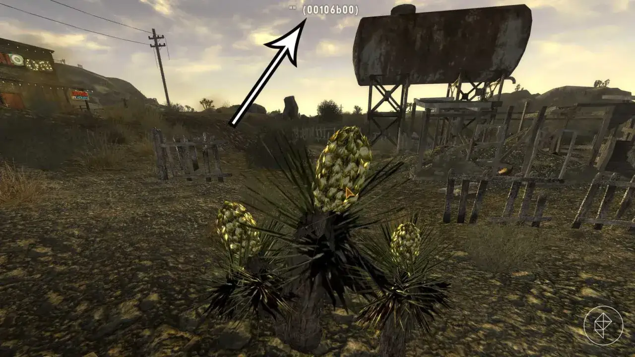 Pustynia w Fallout: New Vegas. Strzałka wskazuje na ID obiektu, pomocne przy wprowadzaniu fallout new vegas kody.