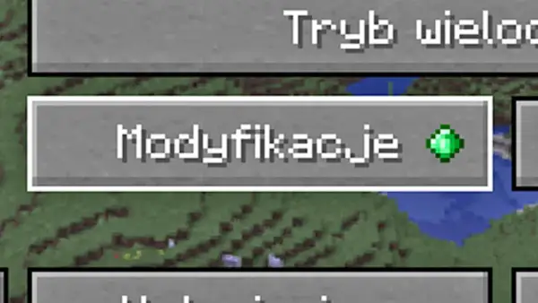 Ekran gry Minecraft z opcją "Modyfikacje", która jest kluczem do tego, jak wgrać mody do Minecraft.
