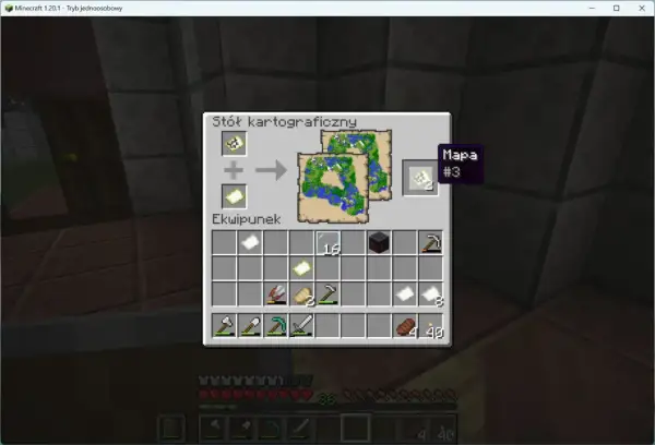 Jak zrobić stół kartograficzny w Minecraft: połącz mapę z pustą mapą, by stworzyć nową, powiększoną mapę.